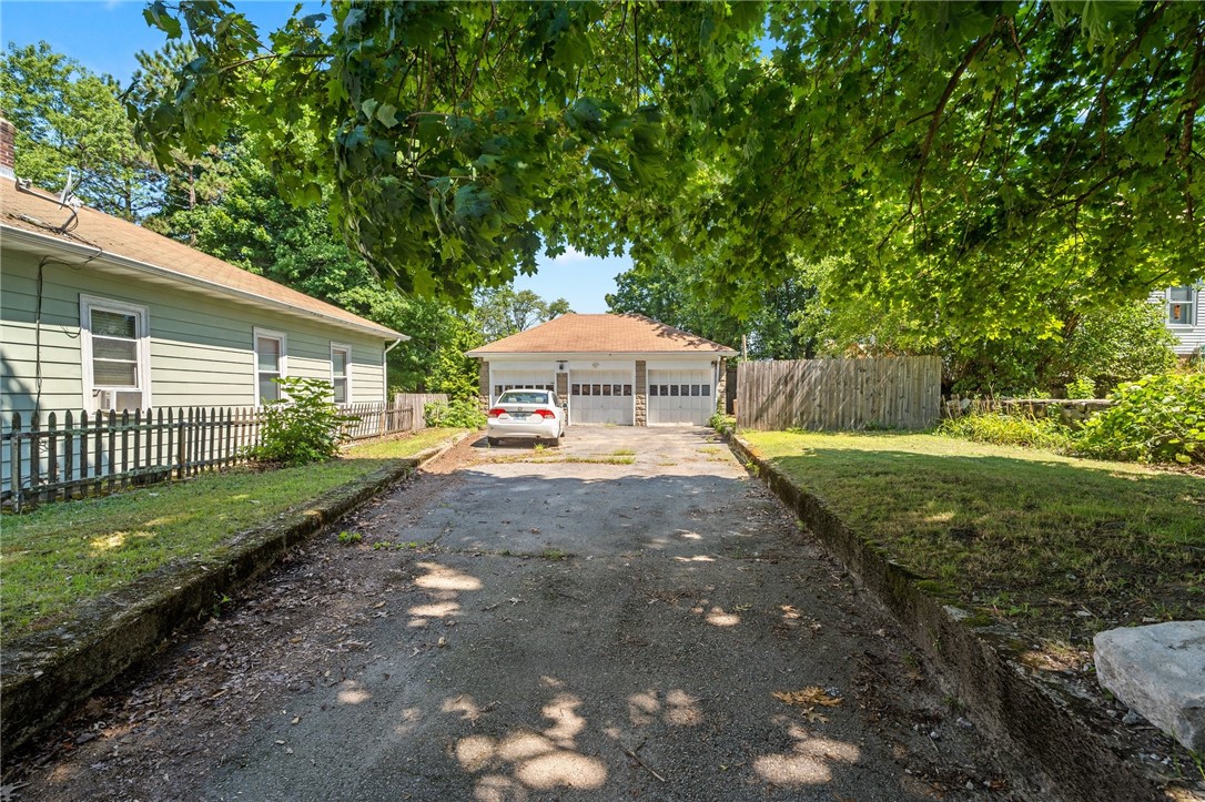 323 Maple Street Woonsocket, RI 02895 - Photo 28 of 40 drive way and garage located at the back of the house