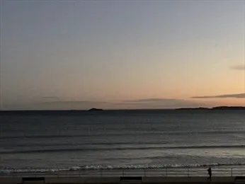 a view of wooden floor with a sink