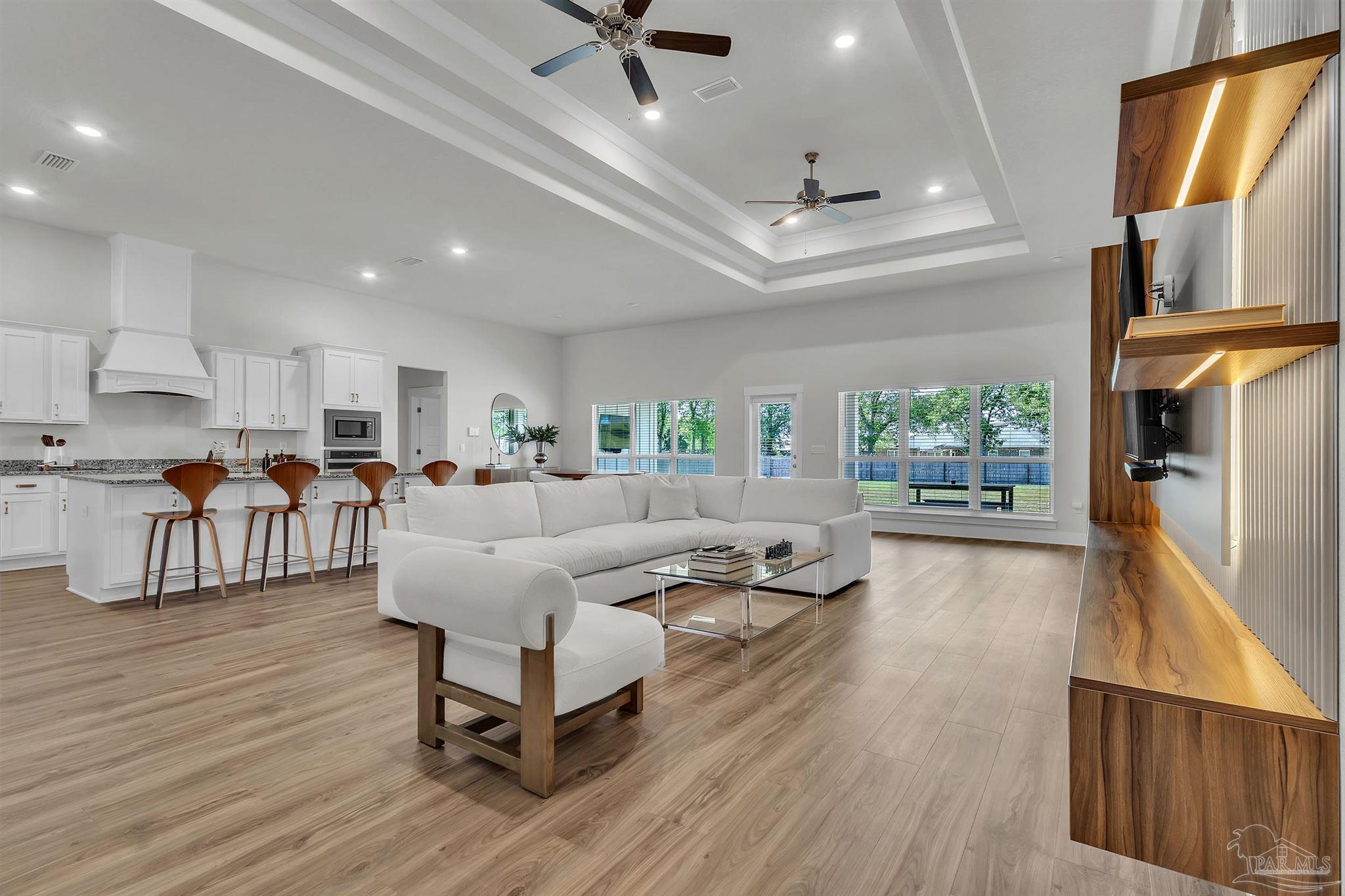 5531 Blake Lane Pace, FL 32571 - Photo 18 of 43 a living room with furniture fireplace and flat screen tv