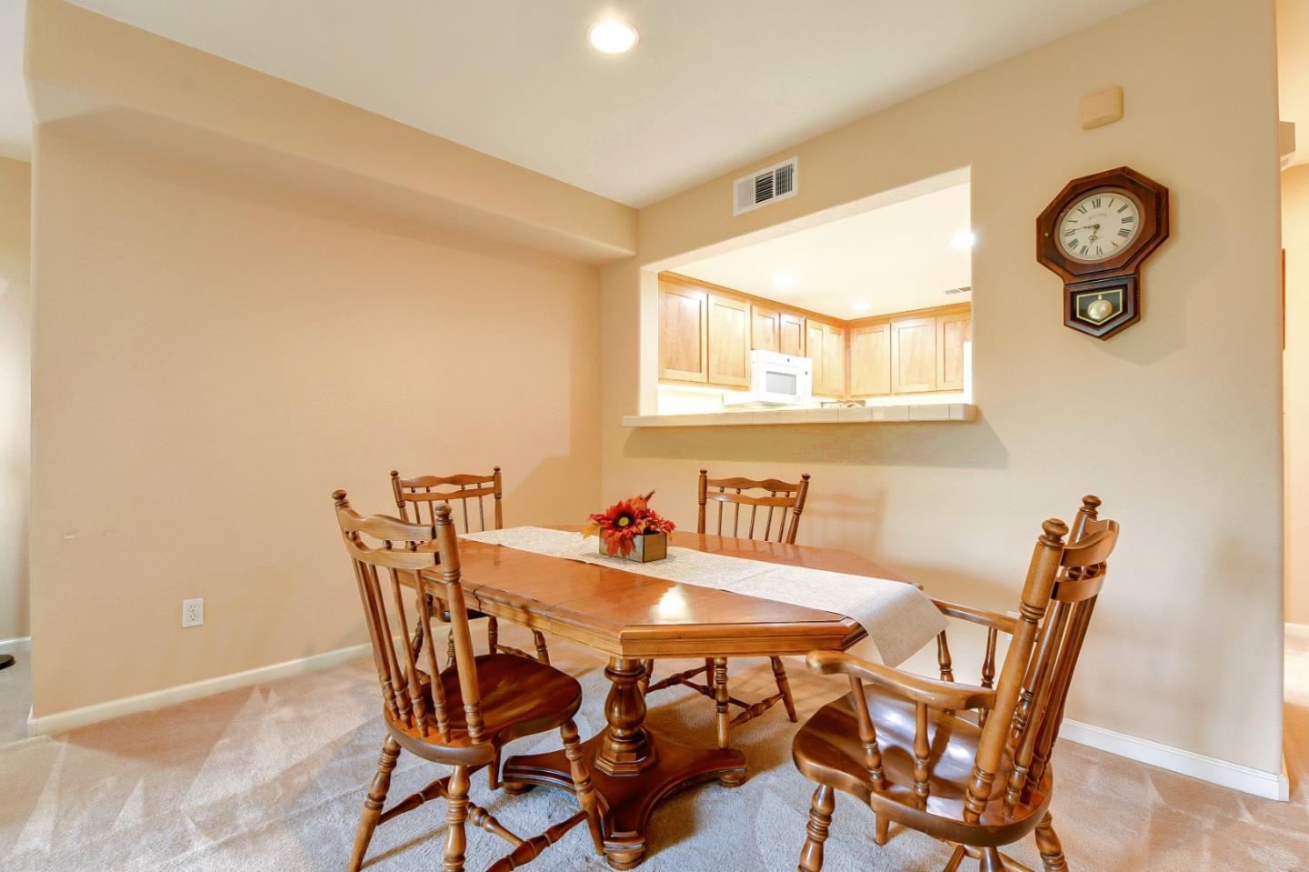 1476 Alegria Loop San Jose, CA 95128 - Photo 11 of 25 a view of a dining room and a table and chairs