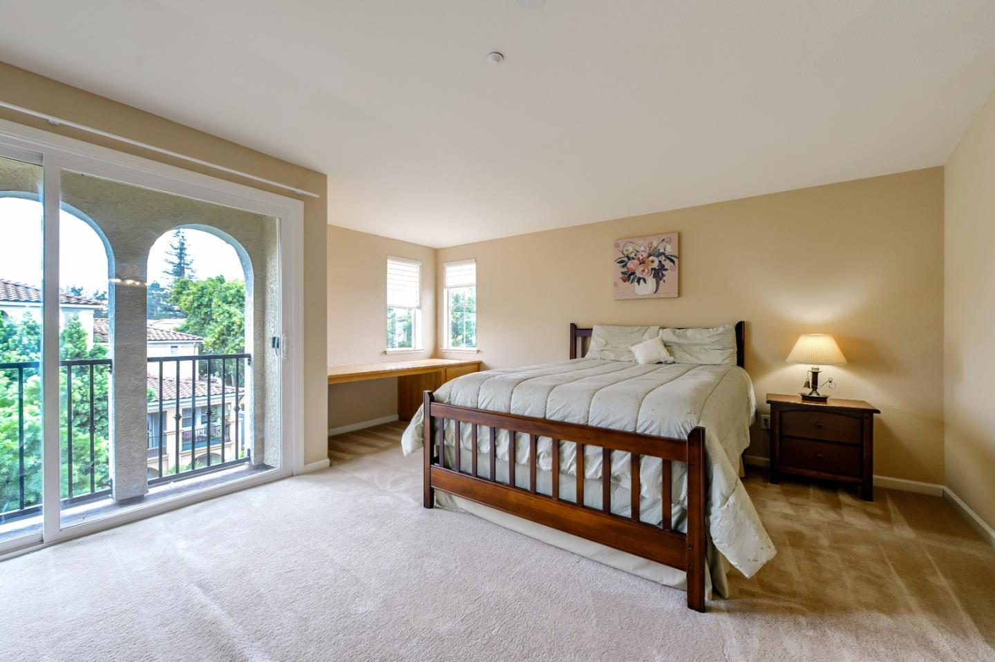 1476 Alegria Loop San Jose, CA 95128 - Photo 15 of 25 a spacious bedroom with a bed and a large window