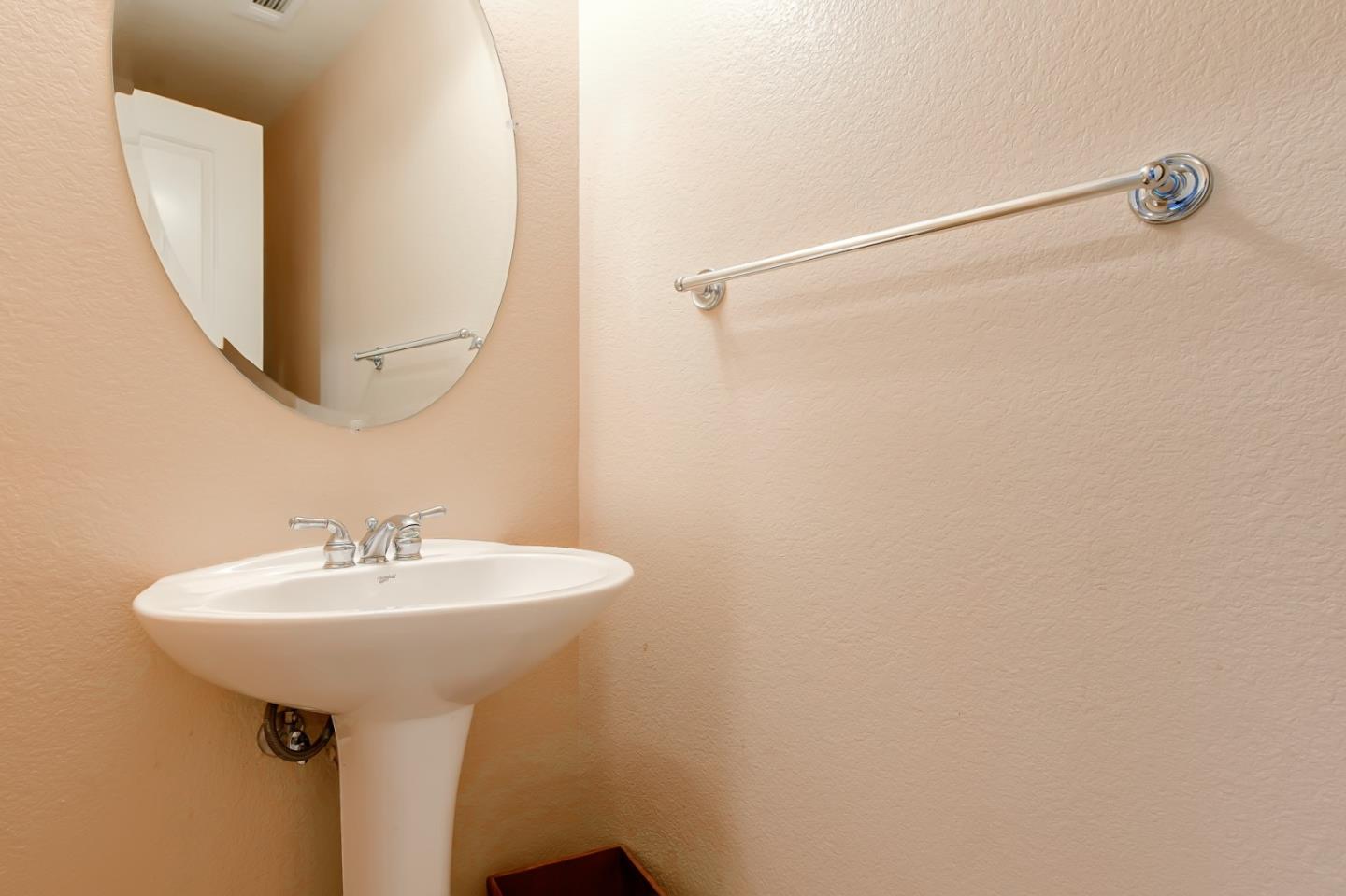 1476 Alegria Loop San Jose, CA 95128 - Photo 18 of 25 a bathroom with a sink and a mirror