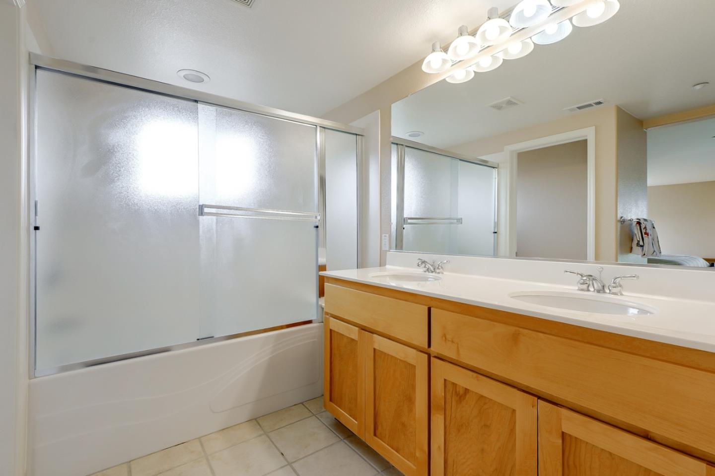 1476 Alegria Loop San Jose, CA 95128 - Photo 20 of 25 a bathroom with a sink bath tub and a mirror
