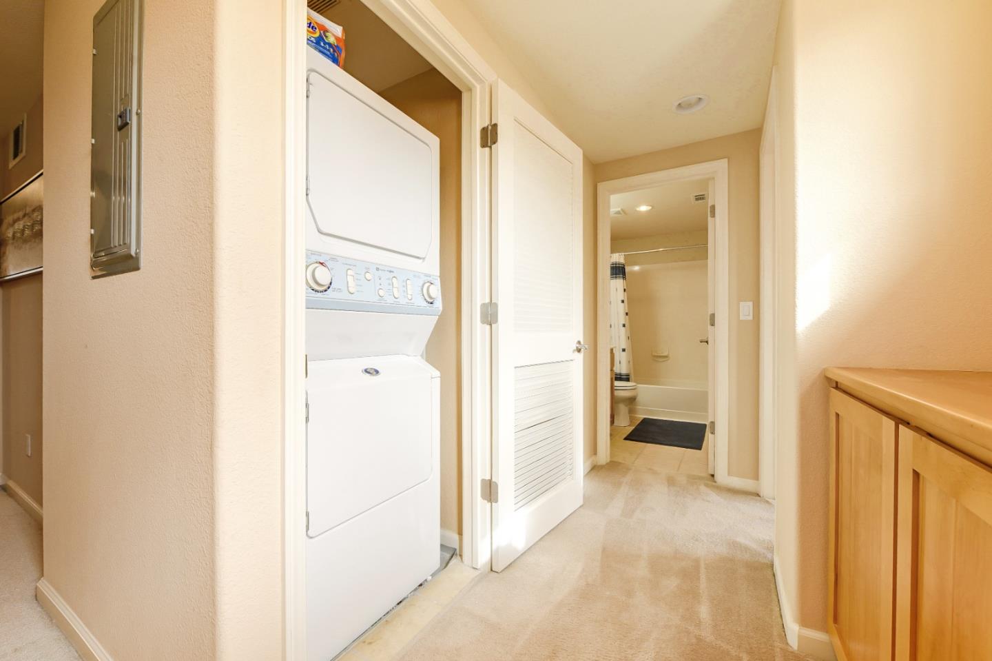 1476 Alegria Loop San Jose, CA 95128 - Photo 21 of 25 a view of a bathroom with a glass door shower