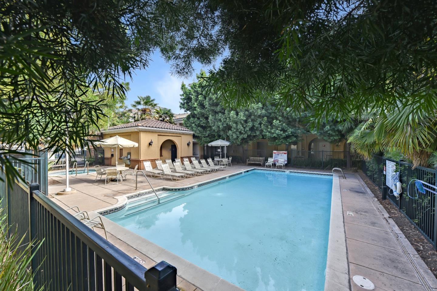 1476 Alegria Loop San Jose, CA 95128 - Photo 25 of 25 a view of a house with backyard and sitting area