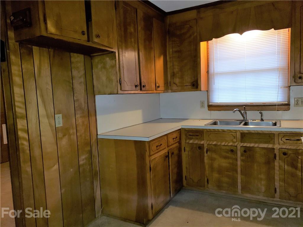 3718 Morgan Mill Road Monroe, NC 28110 - Photo 4 of 13 a bathroom with a sink and a mirror