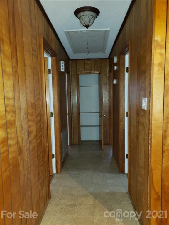 3718 Morgan Mill Road Monroe, NC 28110 - Photo 8 of 13 a view of a hallway with a chandelier