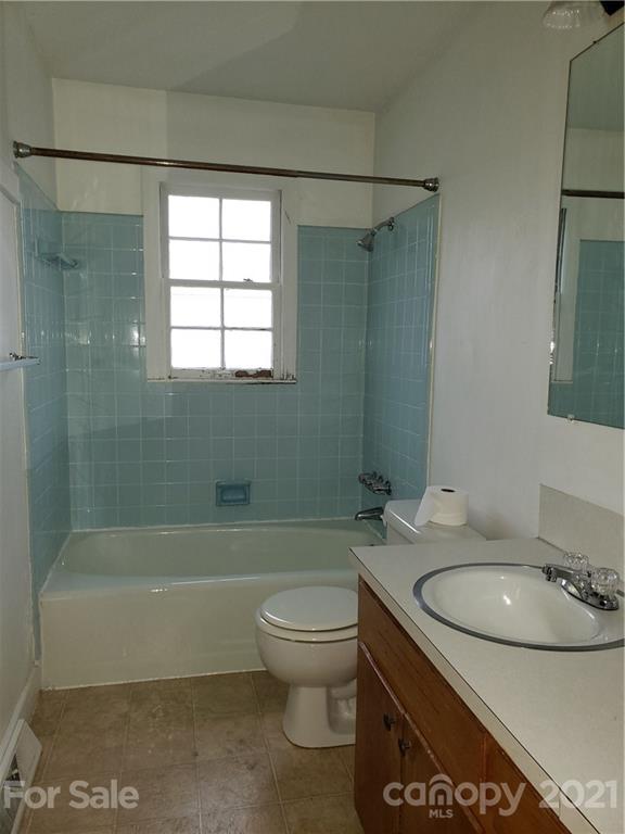 3718 Morgan Mill Road Monroe, NC 28110 - Photo 9 of 13 a bathroom with a sink toilet and shower