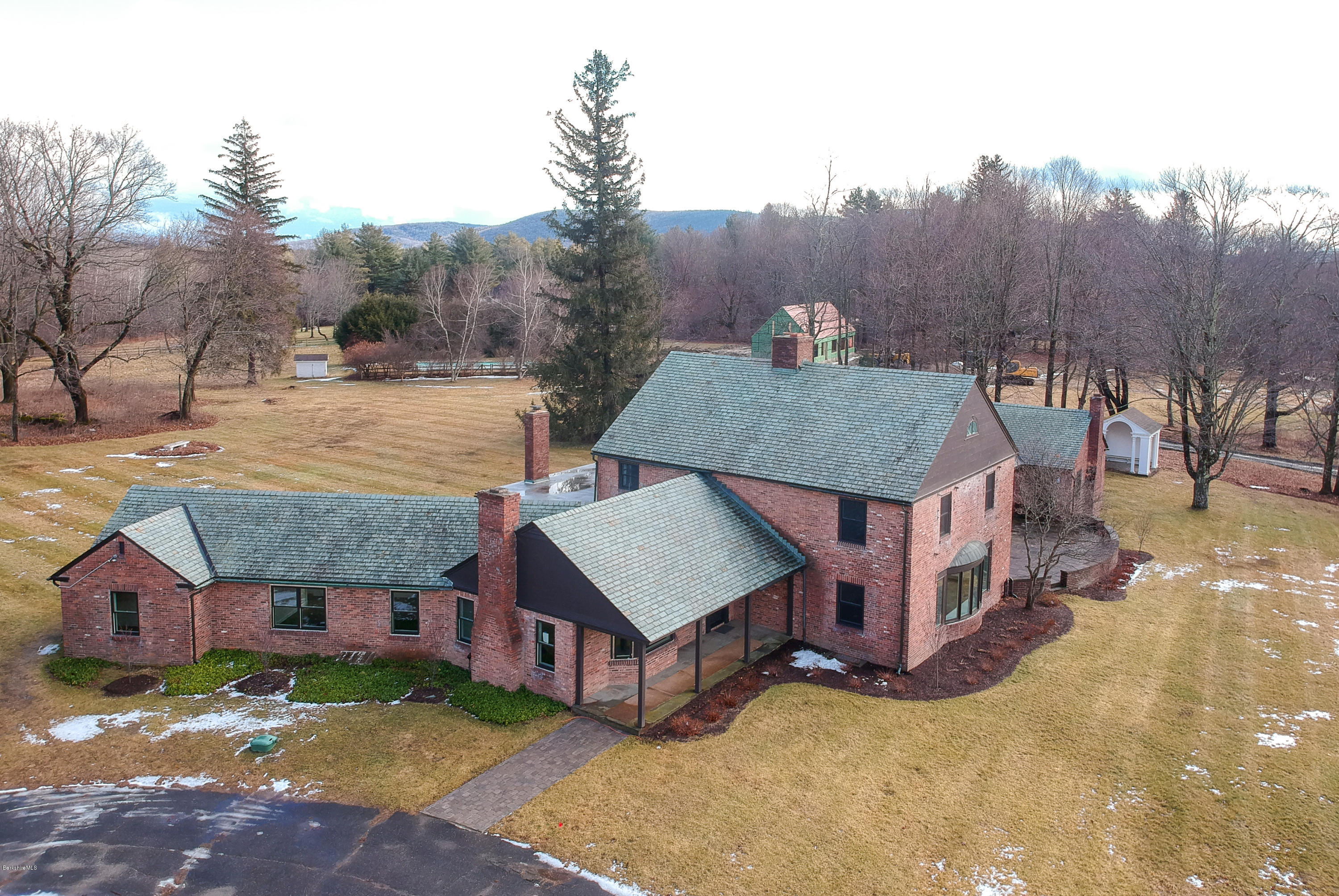 22 Prospect Hill Road Stockbridge, MA 01262 - Photo 1 of 78 a view of a big house with a big yard and large tree