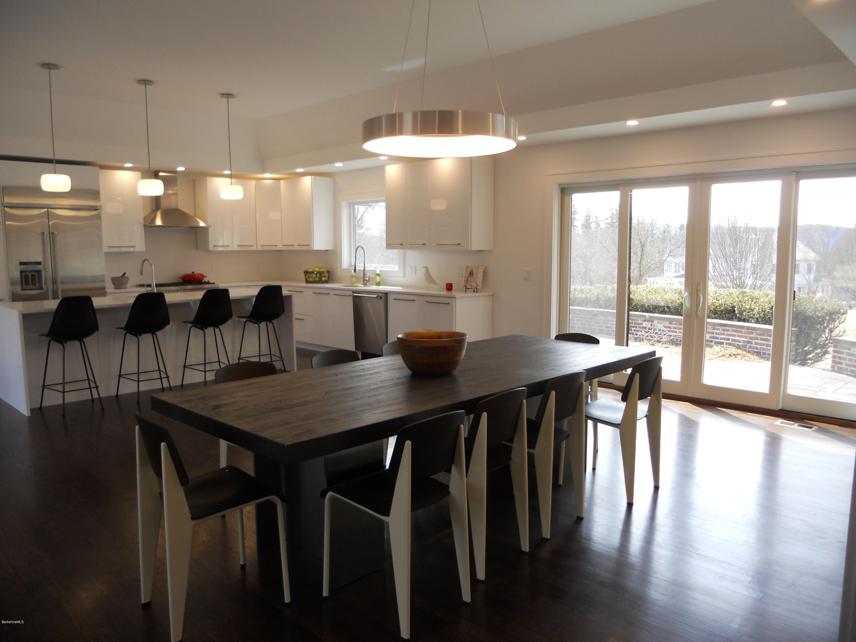 22 Prospect Hill Road Stockbridge, MA 01262 - Photo 32 of 78 a view of a dining room with furniture and wooden floor