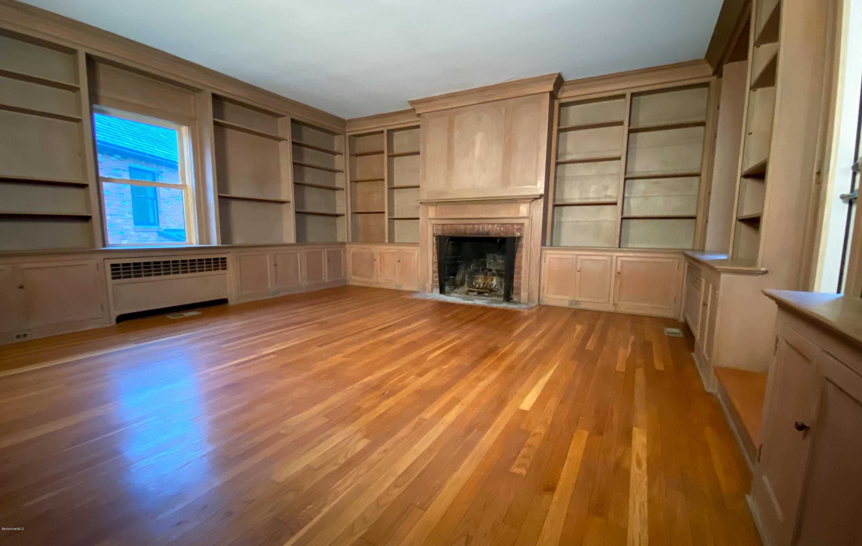 22 Prospect Hill Road Stockbridge, MA 01262 - Photo 34 of 78 a view of empty room with wooden floor and fan
