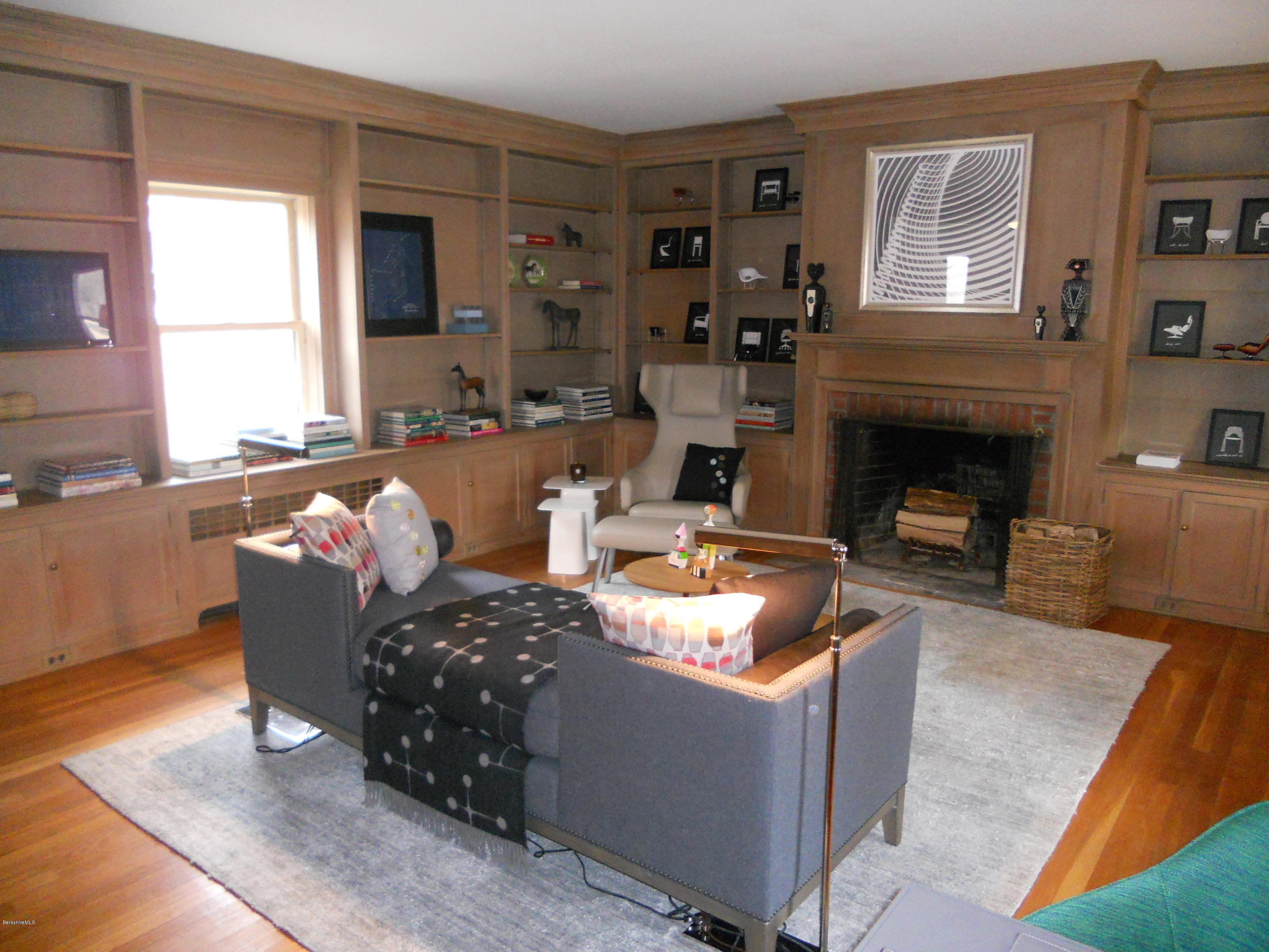22 Prospect Hill Road Stockbridge, MA 01262 - Photo 35 of 78 a living room with furniture and a fireplace