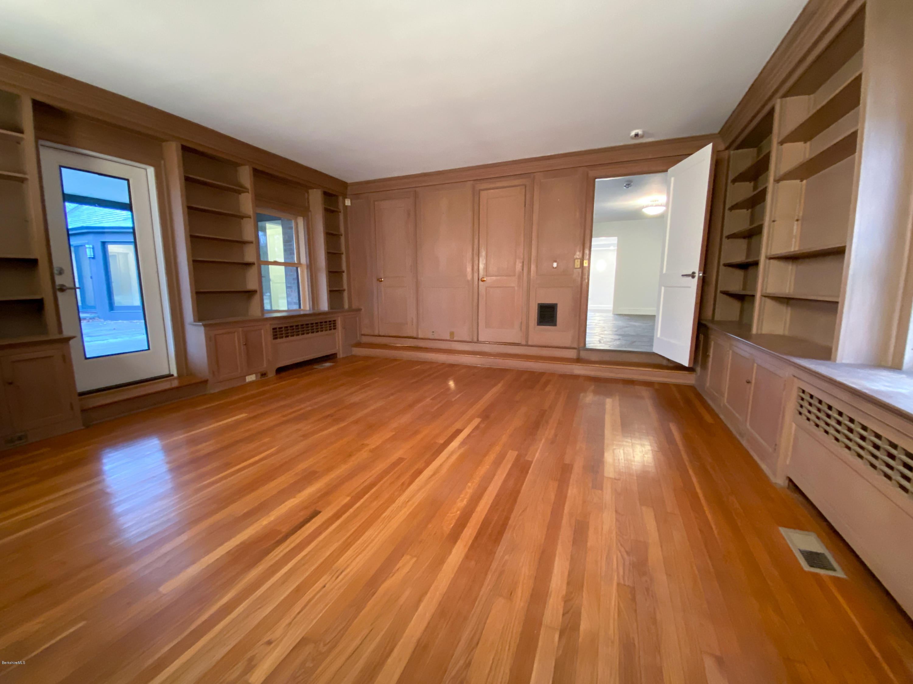 22 Prospect Hill Road Stockbridge, MA 01262 - Photo 36 of 78 a view of a room with wooden floors and stairs
