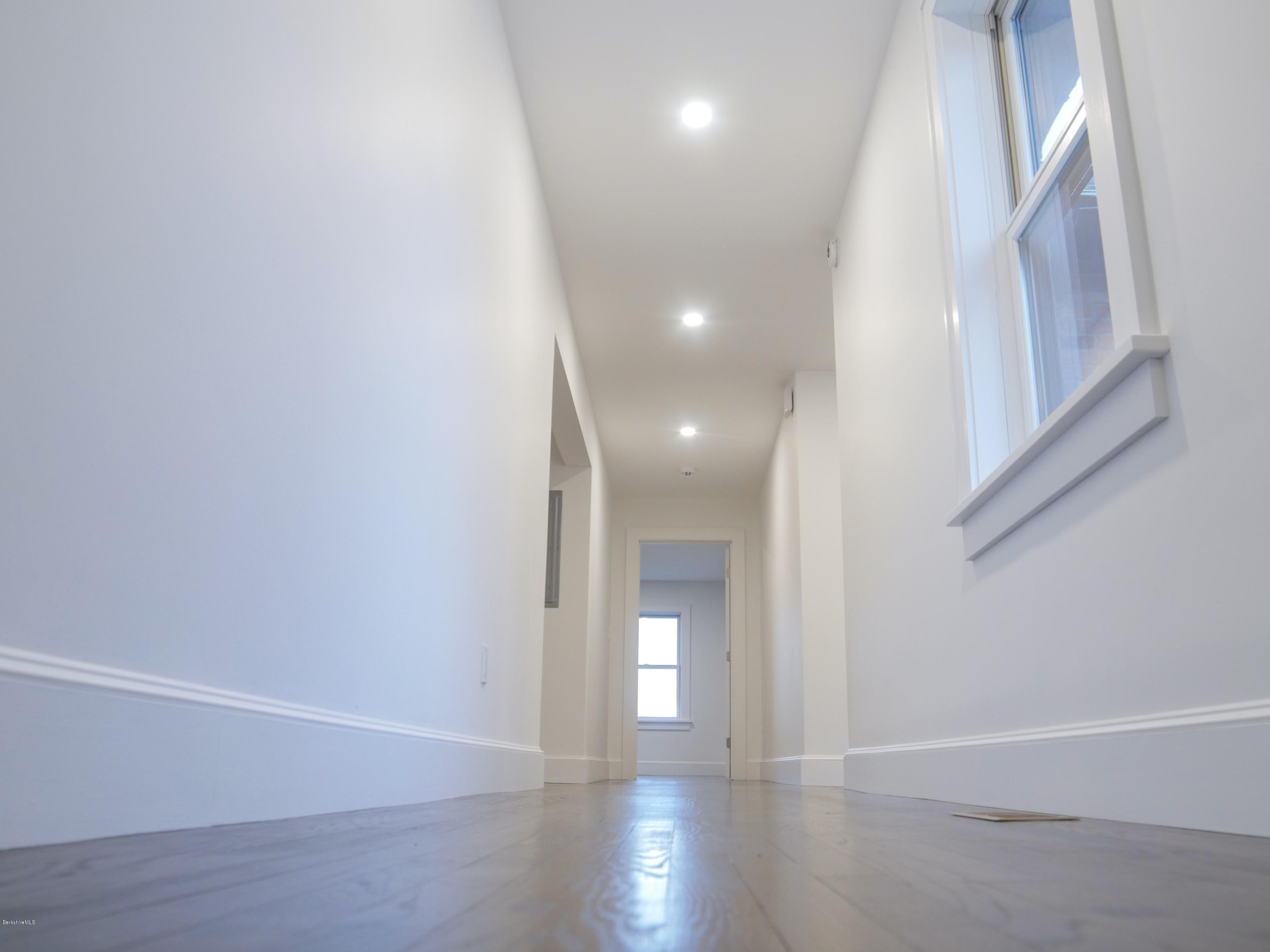 22 Prospect Hill Road Stockbridge, MA 01262 - Photo 46 of 78 a view of an empty room with wooden floor and a window