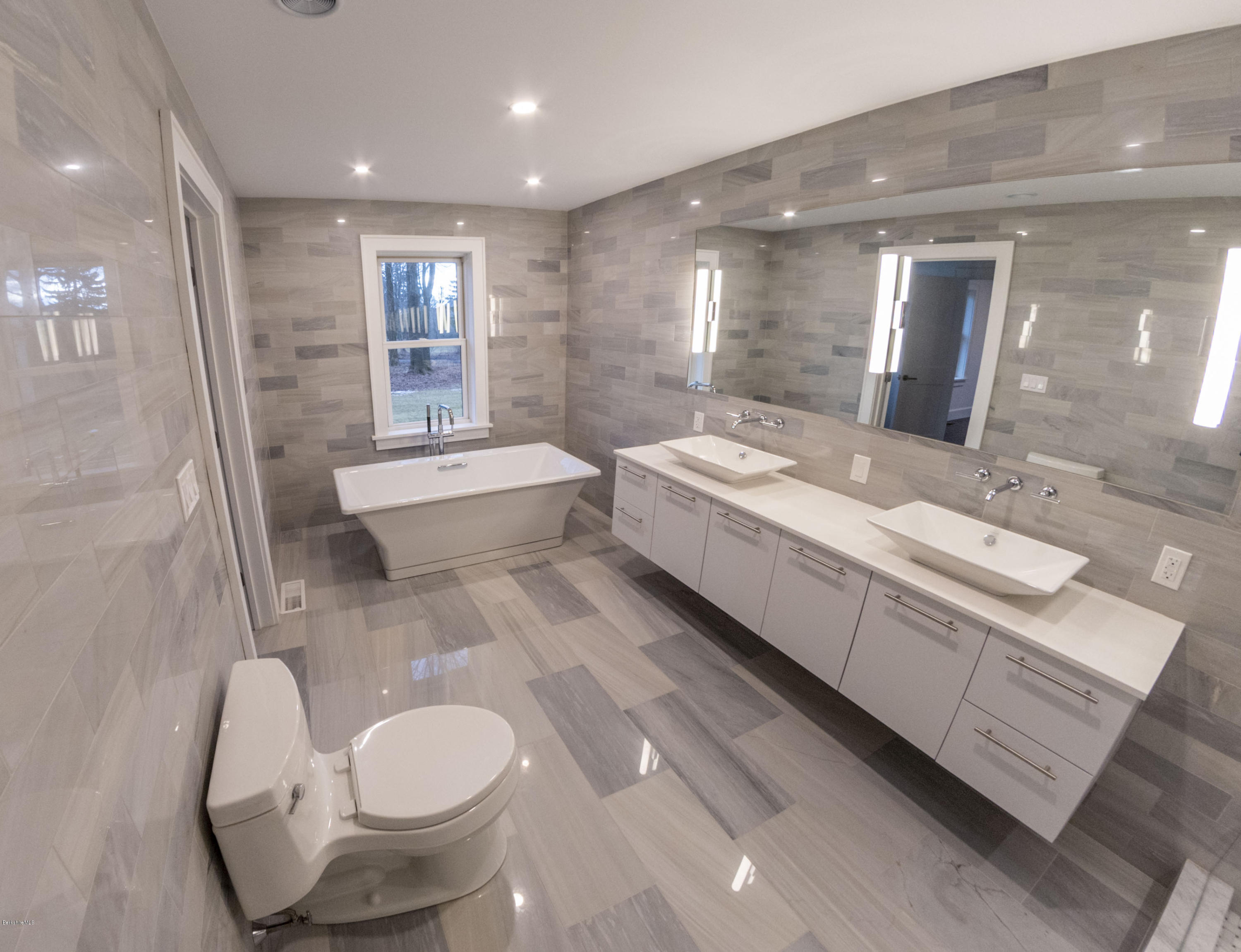 22 Prospect Hill Road Stockbridge, MA 01262 - Photo 49 of 78 a bathroom with a double vanity sink and a mirror