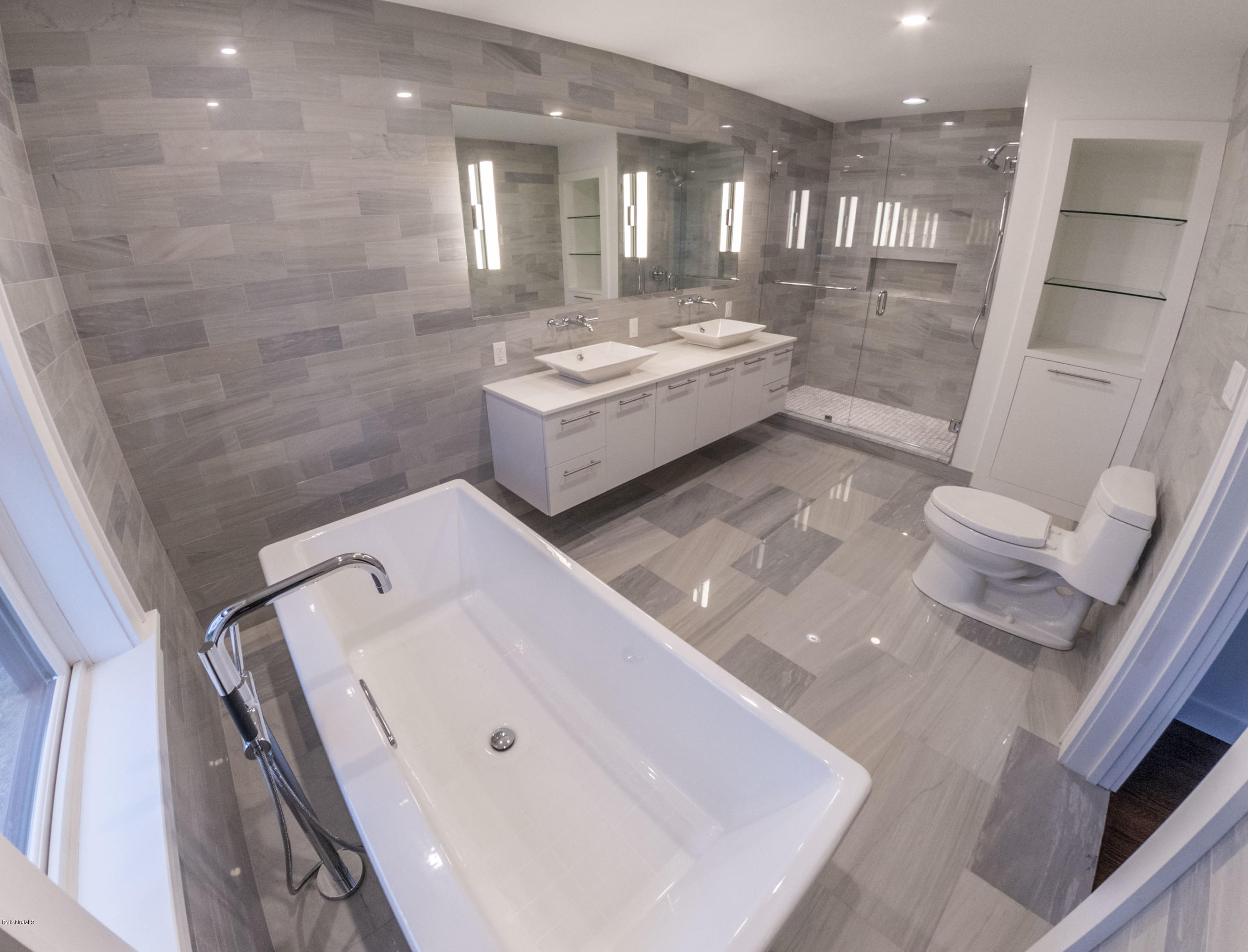 22 Prospect Hill Road Stockbridge, MA 01262 - Photo 51 of 78 a bathroom with a tub sink and mirror