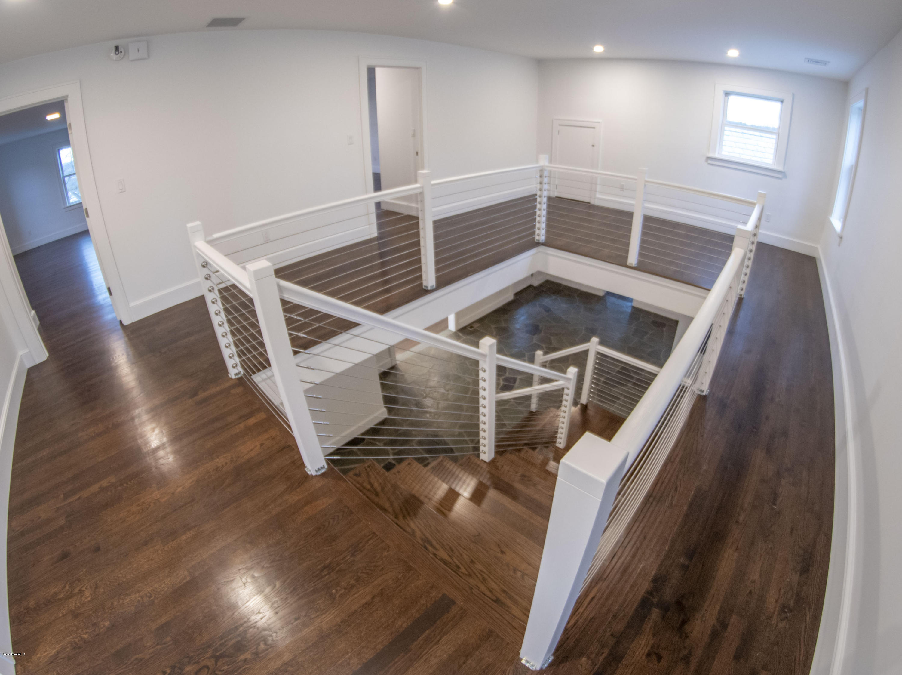 22 Prospect Hill Road Stockbridge, MA 01262 - Photo 59 of 78 a view of an empty room with wooden floor