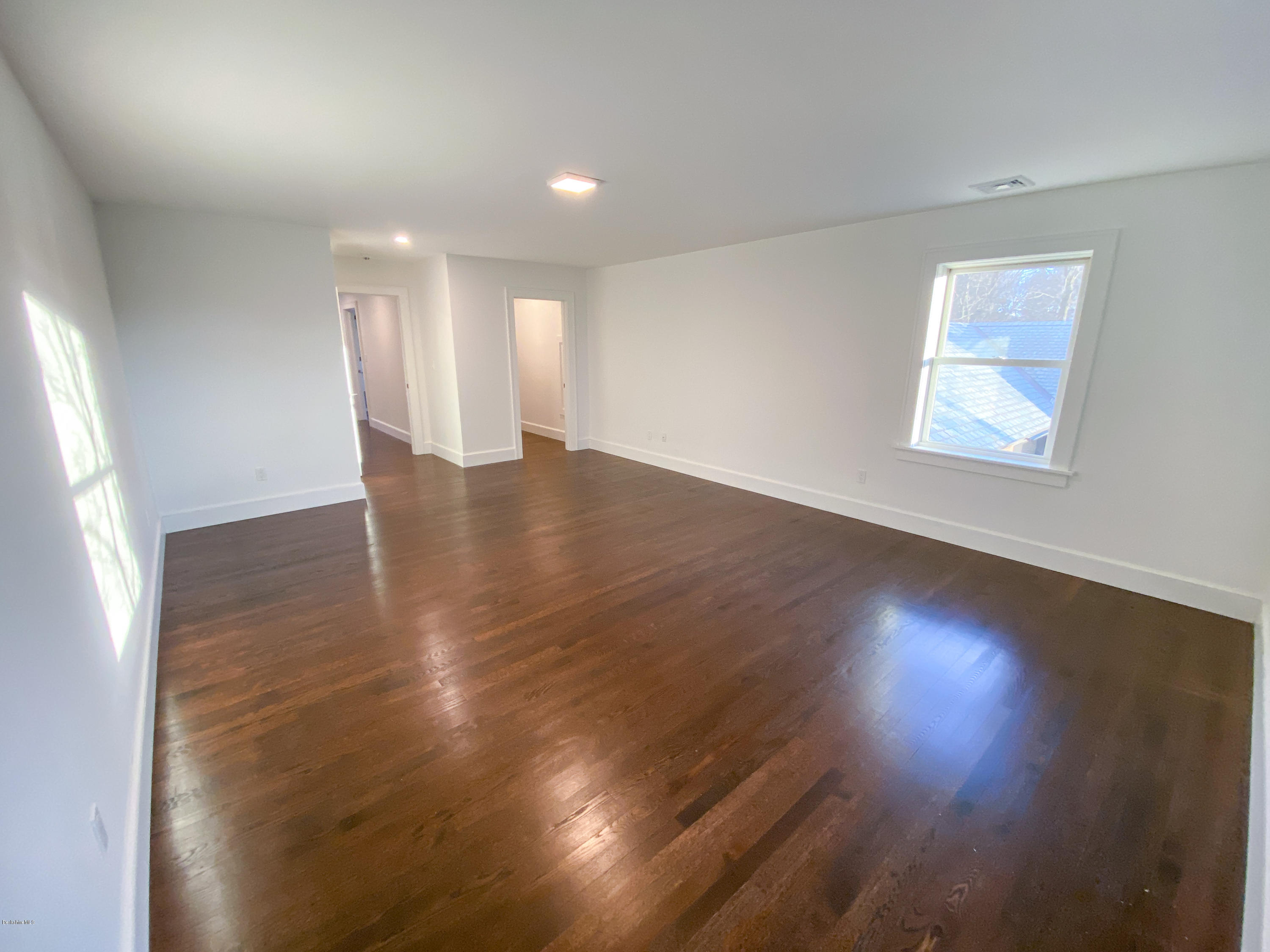 22 Prospect Hill Road Stockbridge, MA 01262 - Photo 60 of 78 a view of an empty room with wooden floor and a window