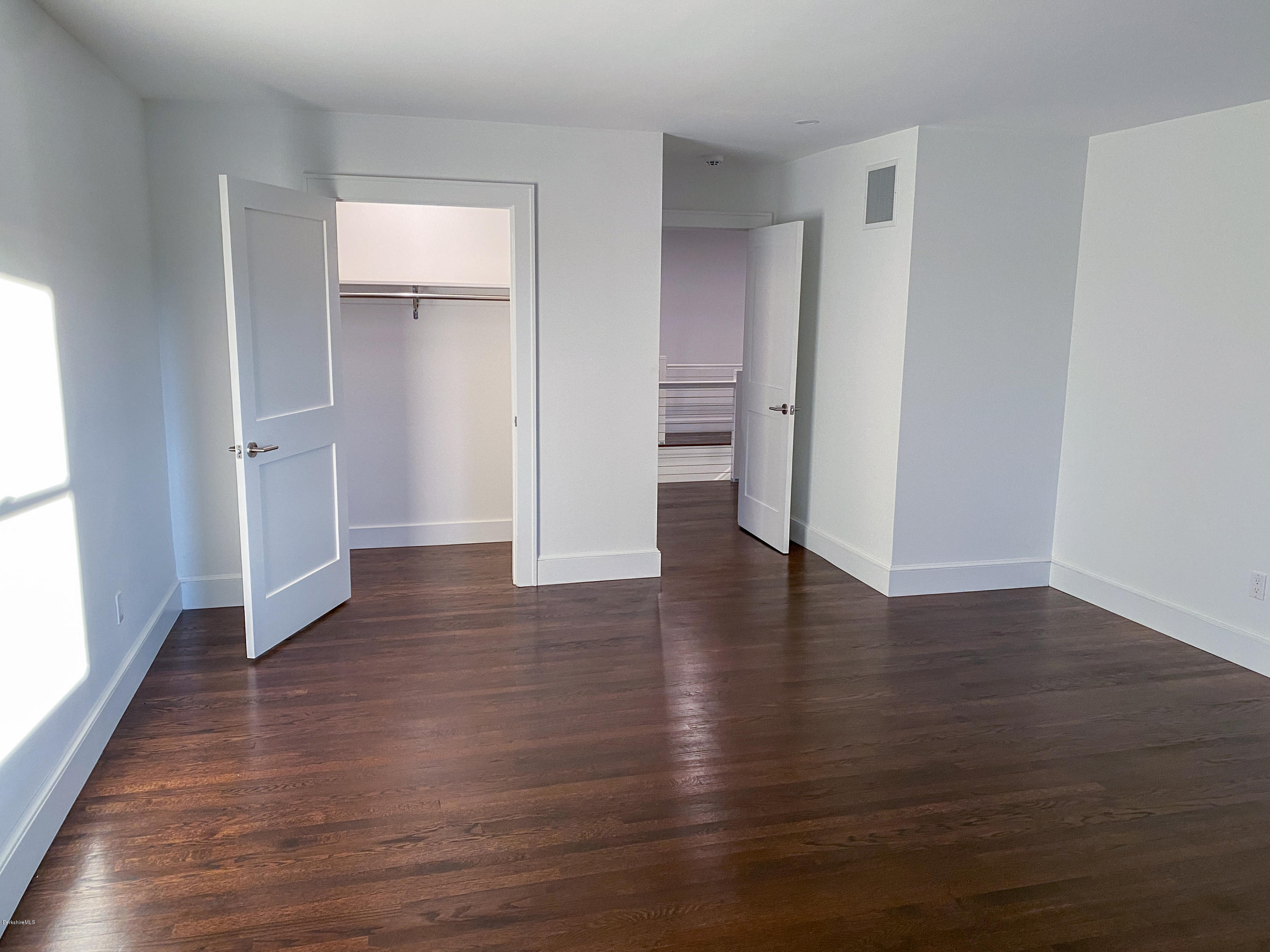 22 Prospect Hill Road Stockbridge, MA 01262 - Photo 64 of 78 a view of empty room with wooden floor