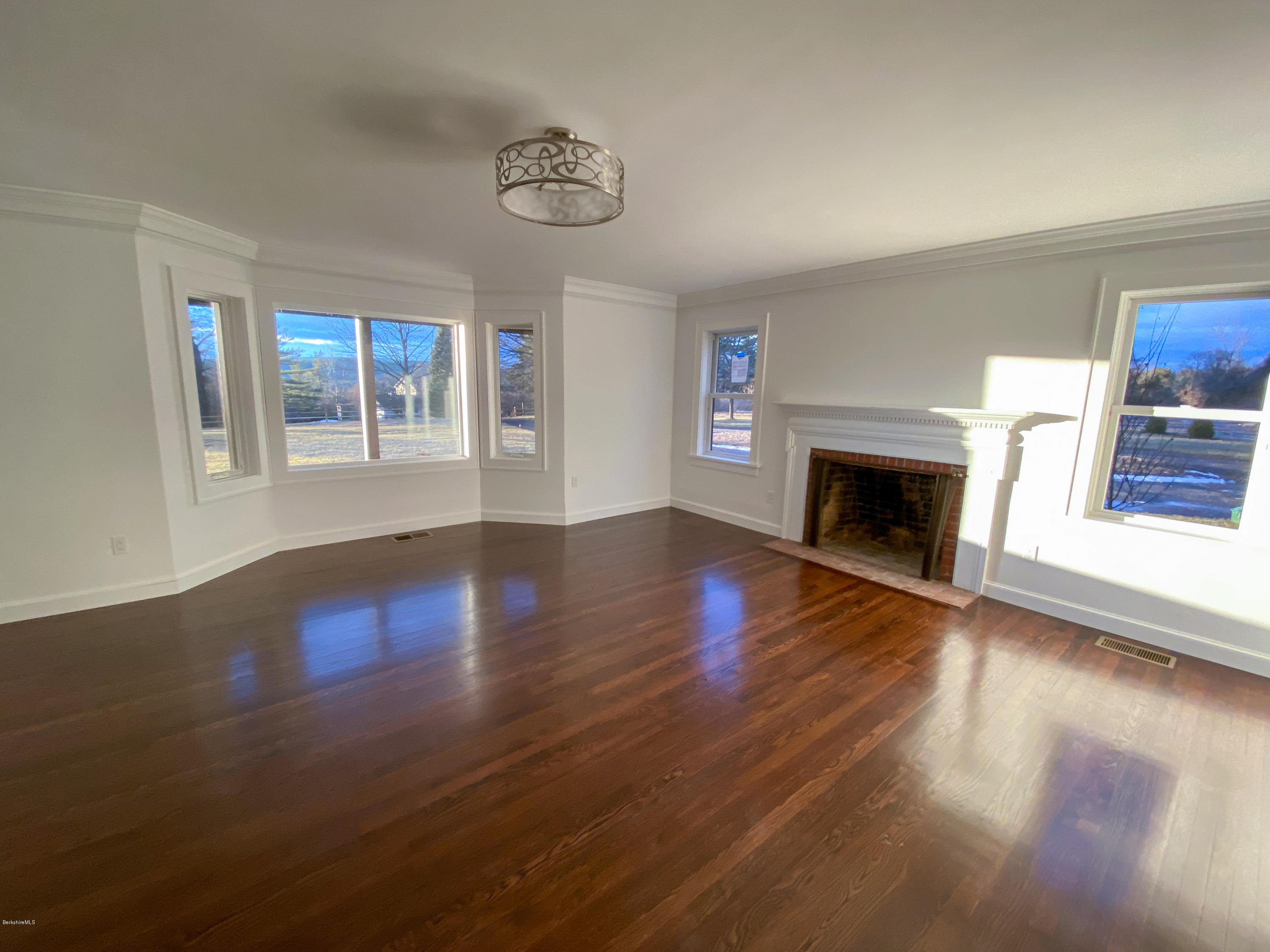 22 Prospect Hill Road Stockbridge, MA 01262 - Photo 66 of 78 a view of an empty room with wooden floor and a window