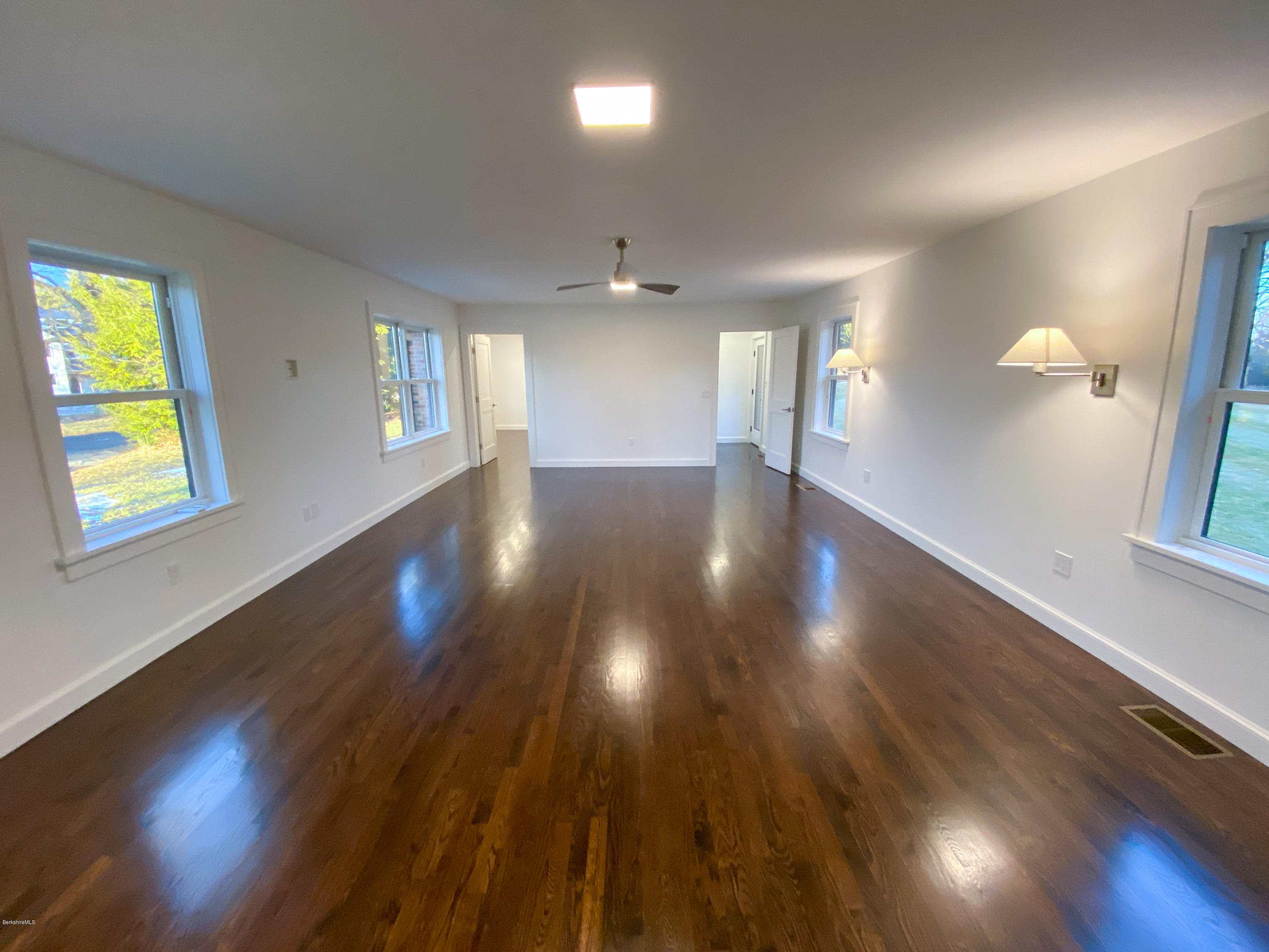 22 Prospect Hill Road Stockbridge, MA 01262 - Photo 68 of 78 an empty room with wooden floor and windows