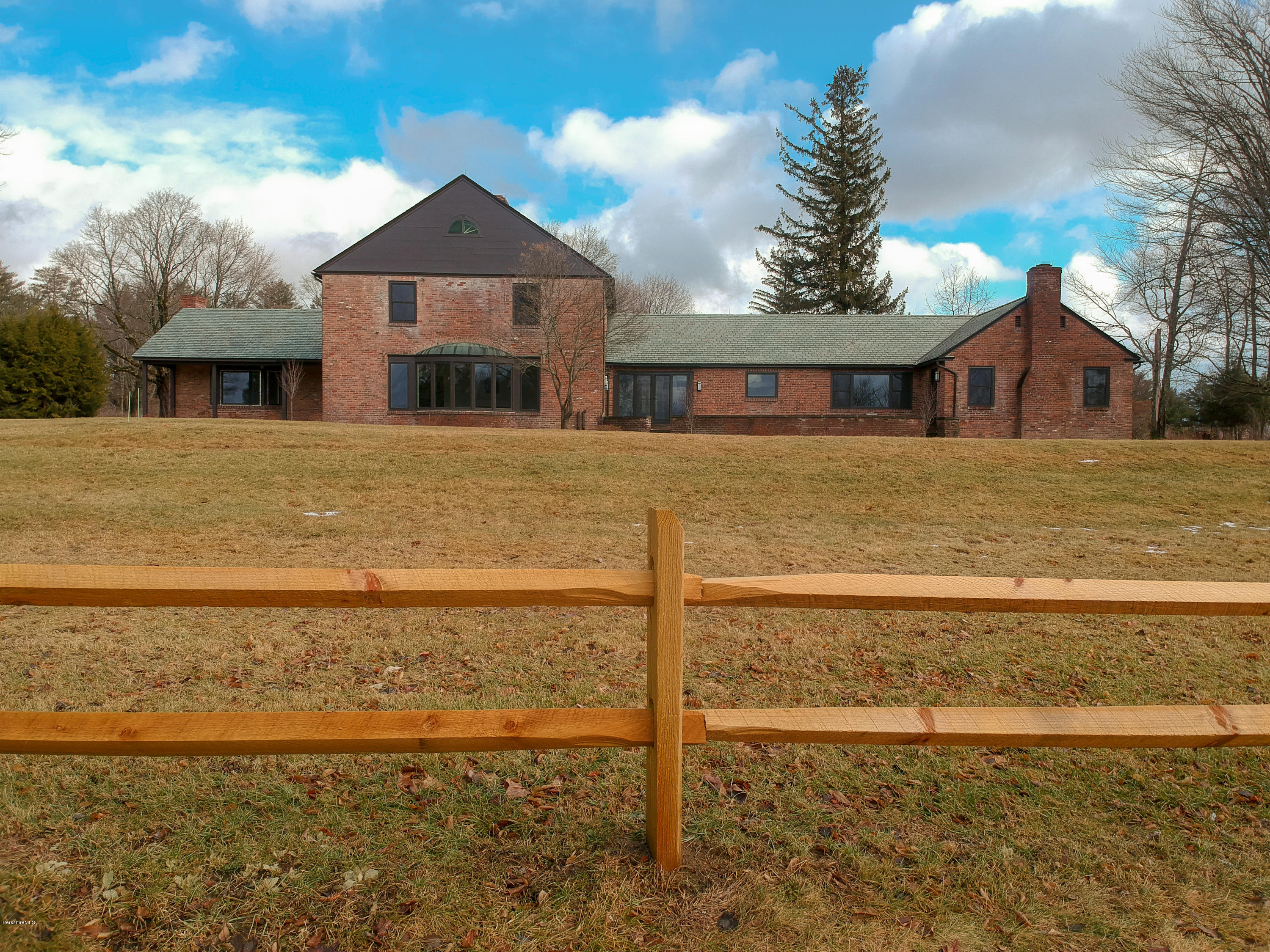 22 Prospect Hill Road Stockbridge, MA 01262 - Photo 76 of 78 a front view of a house with a yard