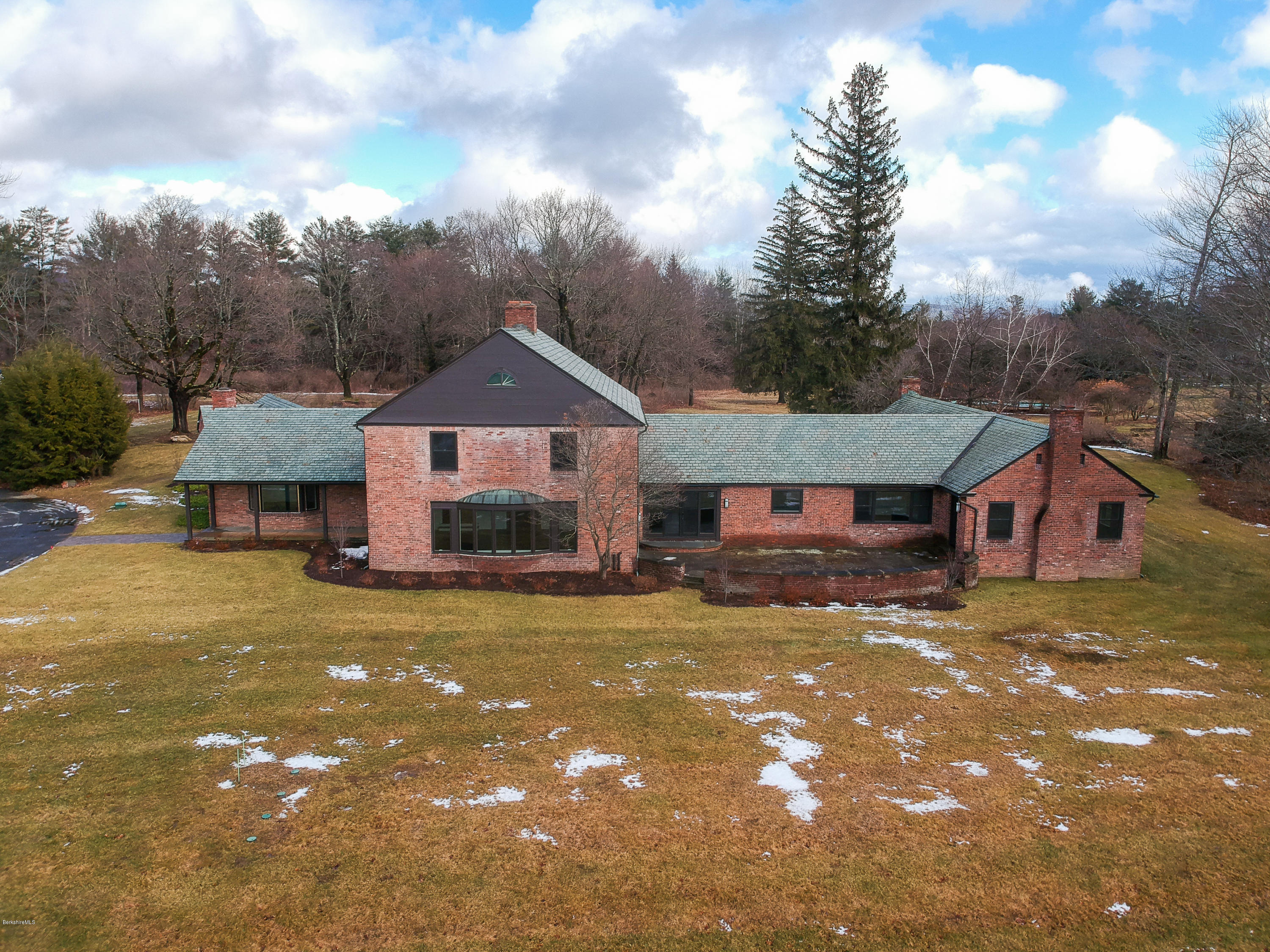 22 Prospect Hill Road Stockbridge, MA 01262 - Photo 78 of 78 a front view of a house with a yard and garage