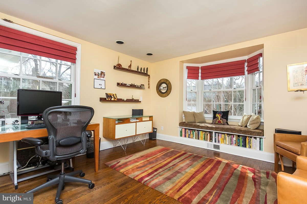 205 Longwood Road Baltimore, MD 21210 - Photo 10 of 30 a view of a workspace with furniture and a window