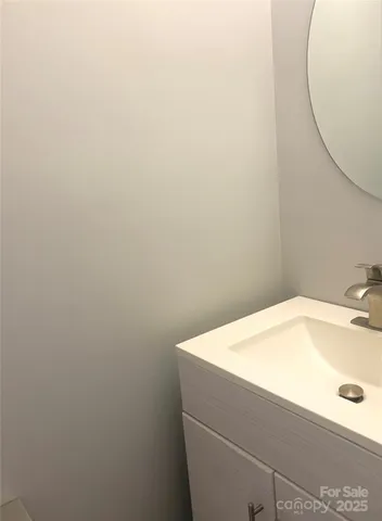 a bathroom with a sink and a vanity