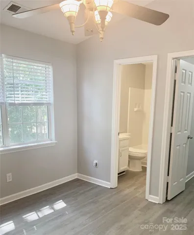a view of a bathroom with a toilet sink and a window