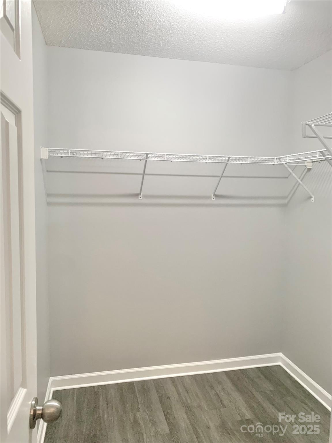 12640 Tucker Crossing Lane Charlotte, NC 28273 - Photo 20 of 36 a view of small space with racks on the wall