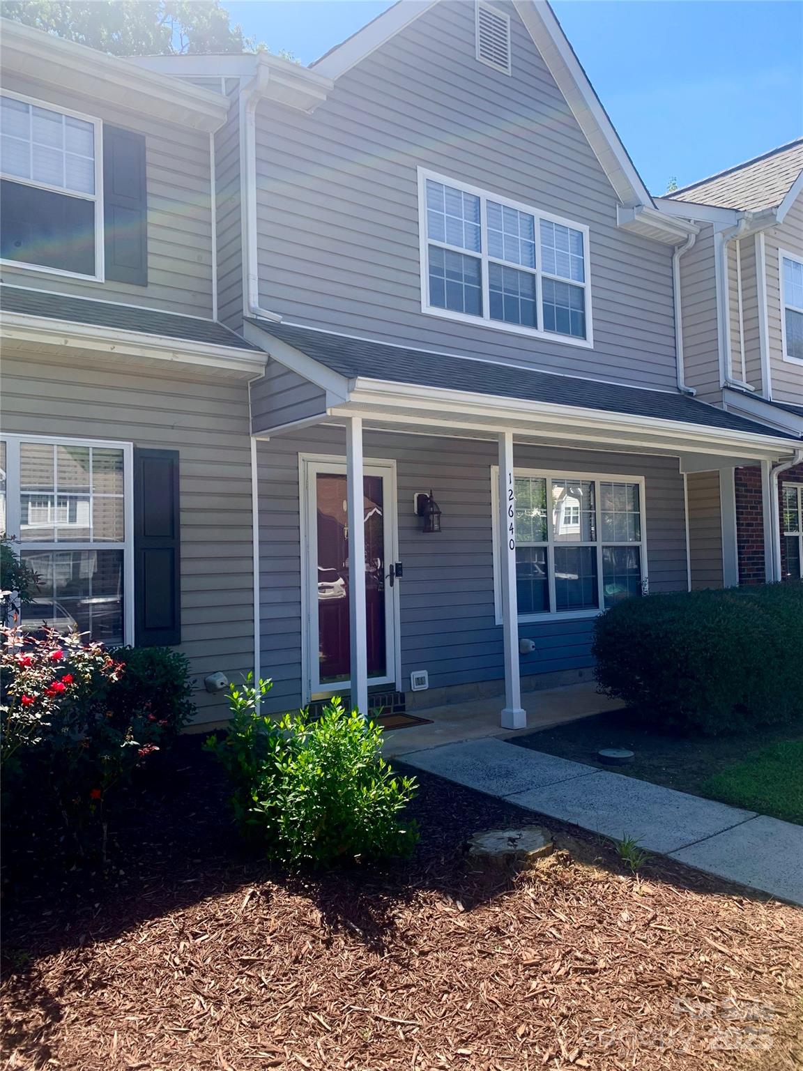 12640 Tucker Crossing Lane Charlotte, NC 28273 - Photo 3 of 36 a view of a house with potted plants