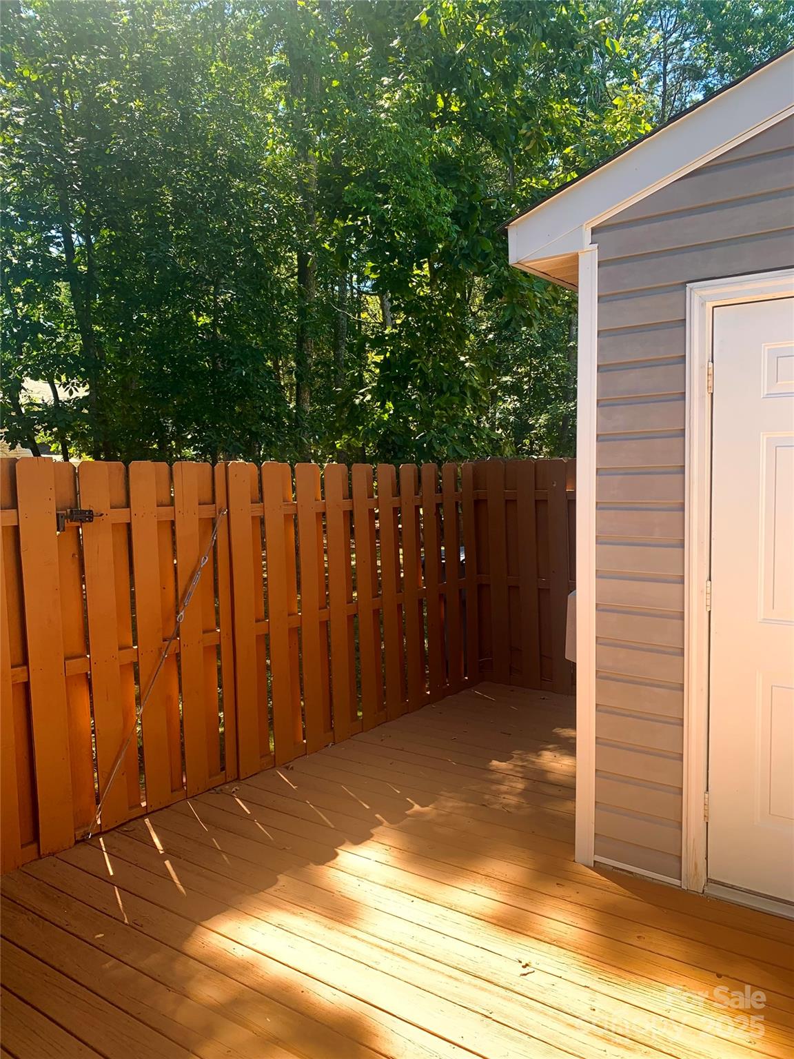 12640 Tucker Crossing Lane Charlotte, NC 28273 - Photo 32 of 36 a view of backyard with wooden fence
