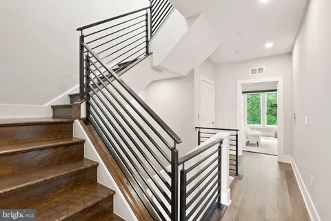 a view of entryway with wooden floor