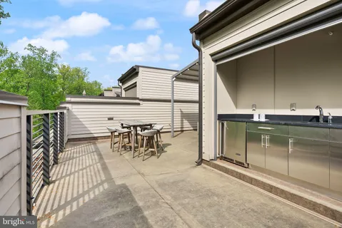 a view of a back yard of the house