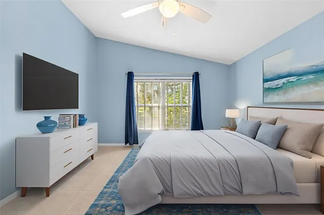 a view of a big room with wooden floor and windows