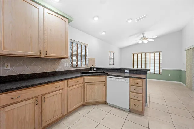 a bathroom with a tub and shower view