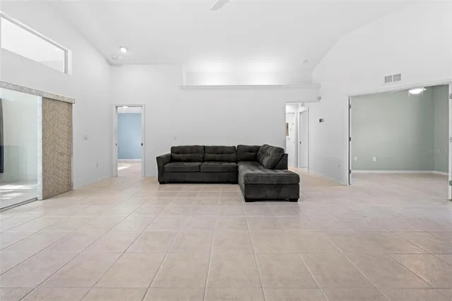 a living room with furniture and a couch