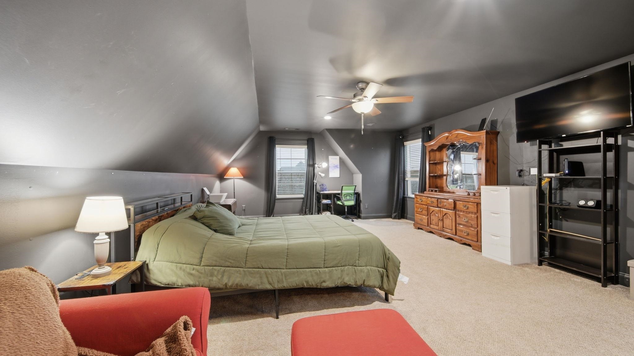 70 Trinity Cove Atoka, TN 38004 - Photo 19 of 25 Carpeted room featuring a sloped ceiling, recessed lighting, and a ceiling fan with light fixture