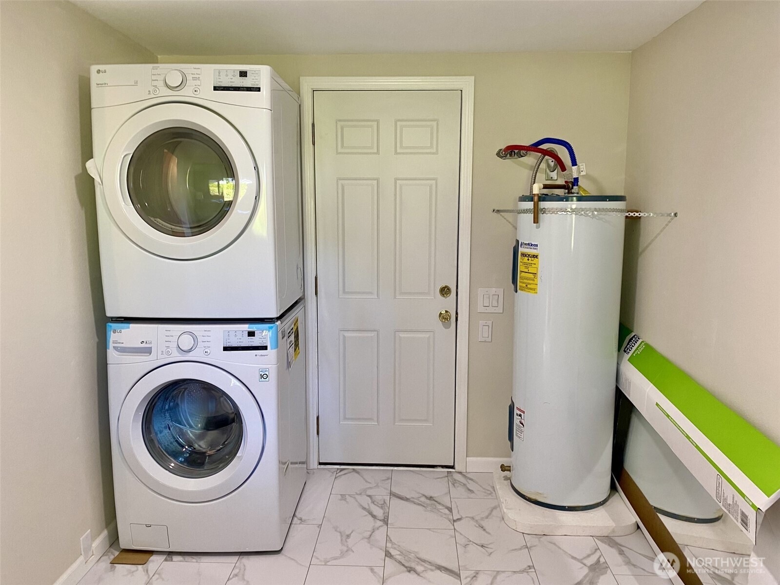 1304 Madrona Beach Road Northwest Olympia, WA 98502 - Photo 30 of 40 a utility room with dryer and washer