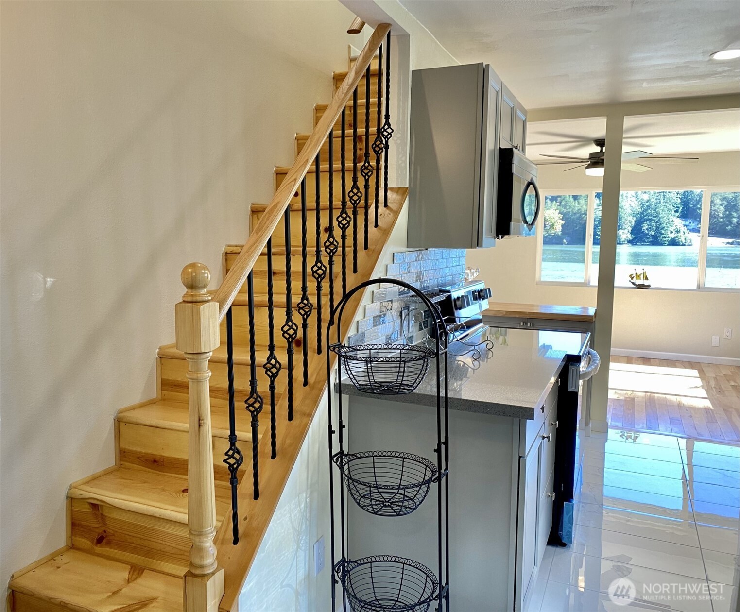 1304 Madrona Beach Road Northwest Olympia, WA 98502 - Photo 32 of 40 a view of entryway and hall with wooden floor