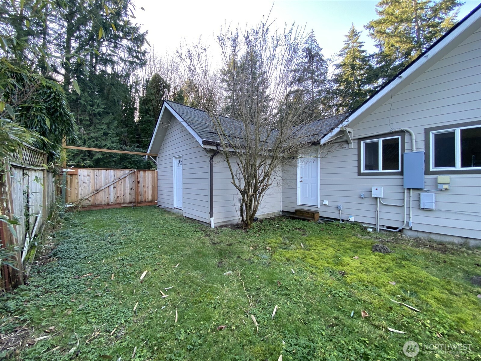 1304 Madrona Beach Road Northwest Olympia, WA 98502 - Photo 39 of 40 a backyard of a house with seating space
