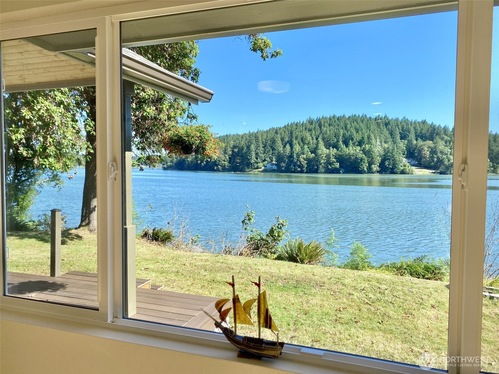 1304 Madrona Beach Road Northwest Olympia, WA 98502 - Photo 5 of 40 a view of a lake from a window