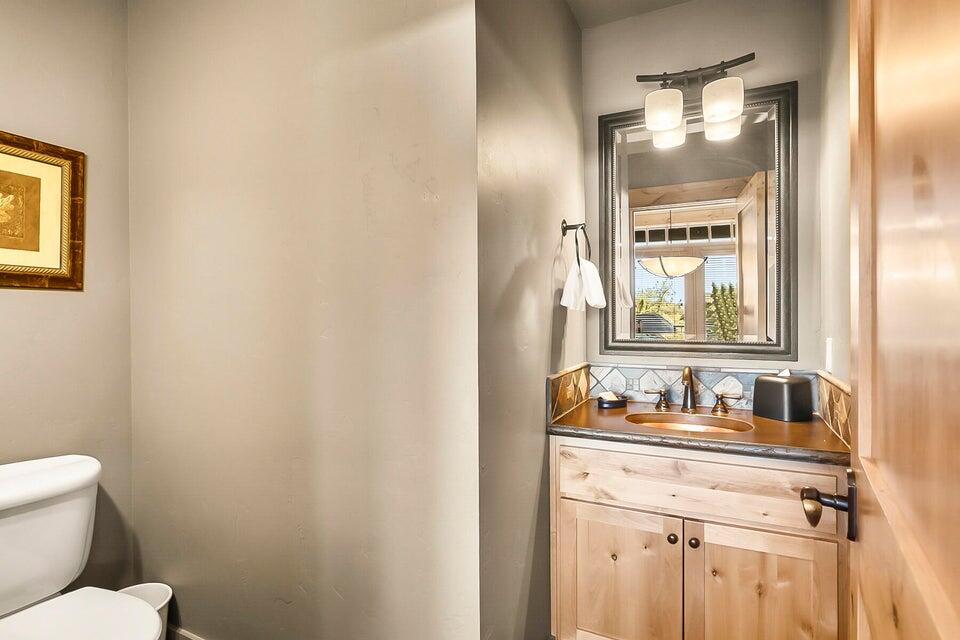 16845 South W Brasada Ranch Road, Unit 23 Powell Butte, OR 97753 - Photo 25 of 47 a bathroom with a sink and a mirror
