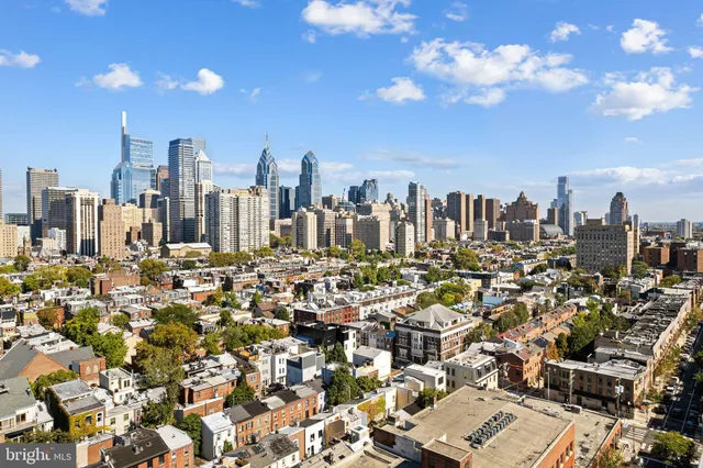 a view of a city with tall buildings