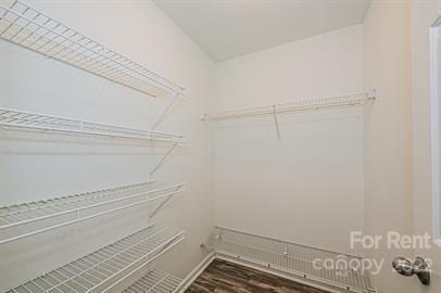 308 South Hoskins Road, Unit D Charlotte, NC 28208 - Photo 16 of 19 a view of small space with racks on the wall