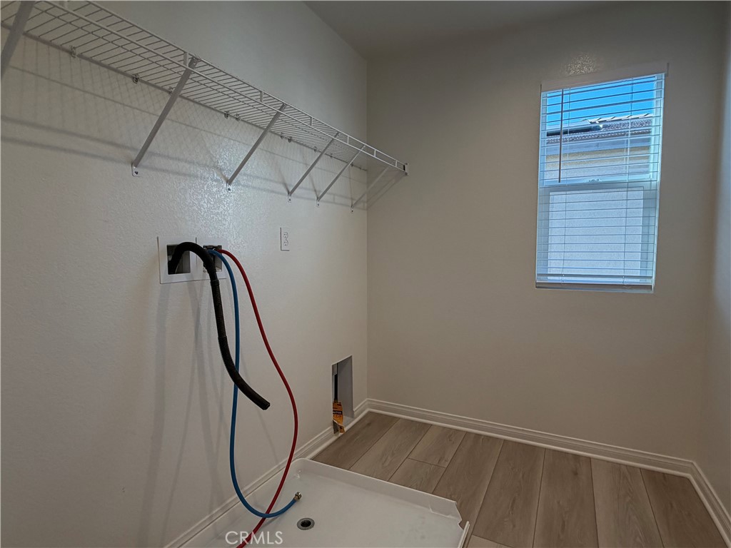 7631 Rubyred Gln Drive Riverside, CA 92507 - Photo 17 of 17 a view of entryway with wooden floor