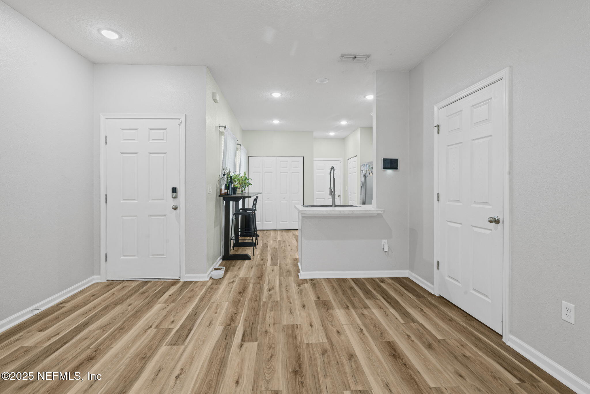 852 Capitol Parkway Jacksonville, FL 32218 - Photo 12 of 42 a view of a room with wooden floor