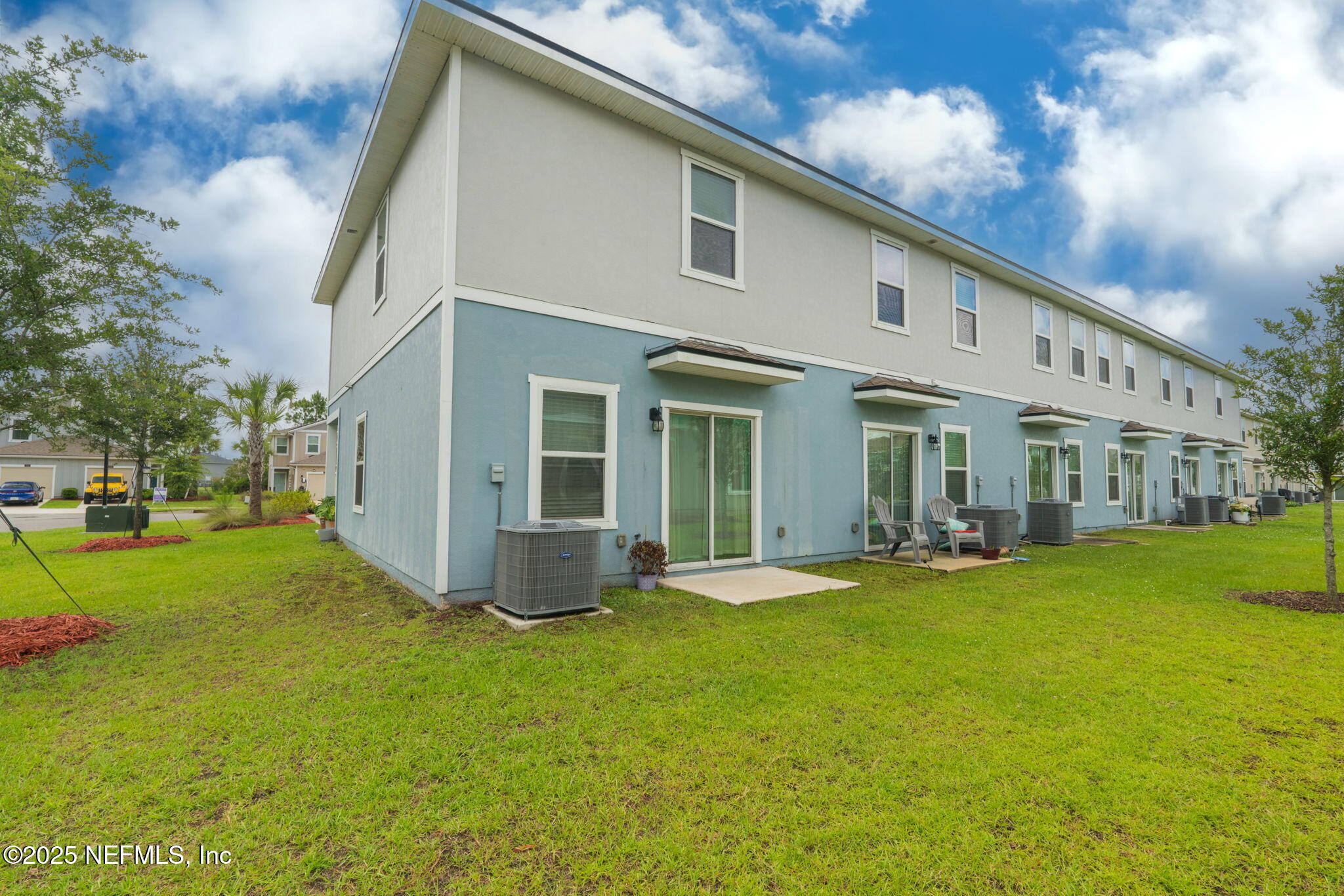852 Capitol Parkway Jacksonville, FL 32218 - Photo 30 of 42 a view of a house with a yard and sitting area