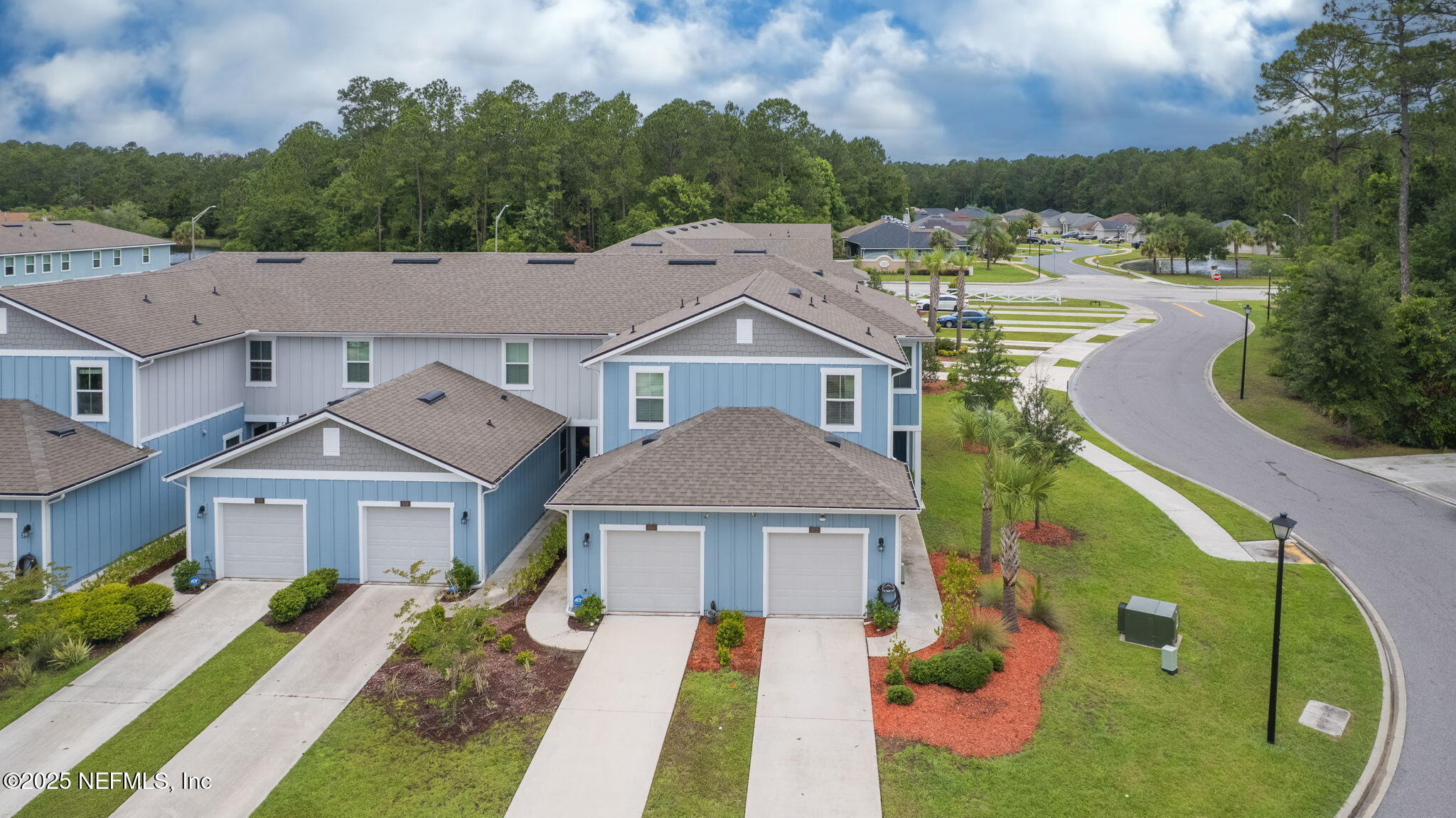 852 Capitol Parkway Jacksonville, FL 32218 - Photo 34 of 42 a aerial view of a house with a yard